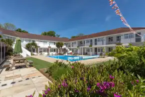 Exterior view of apartments & pool